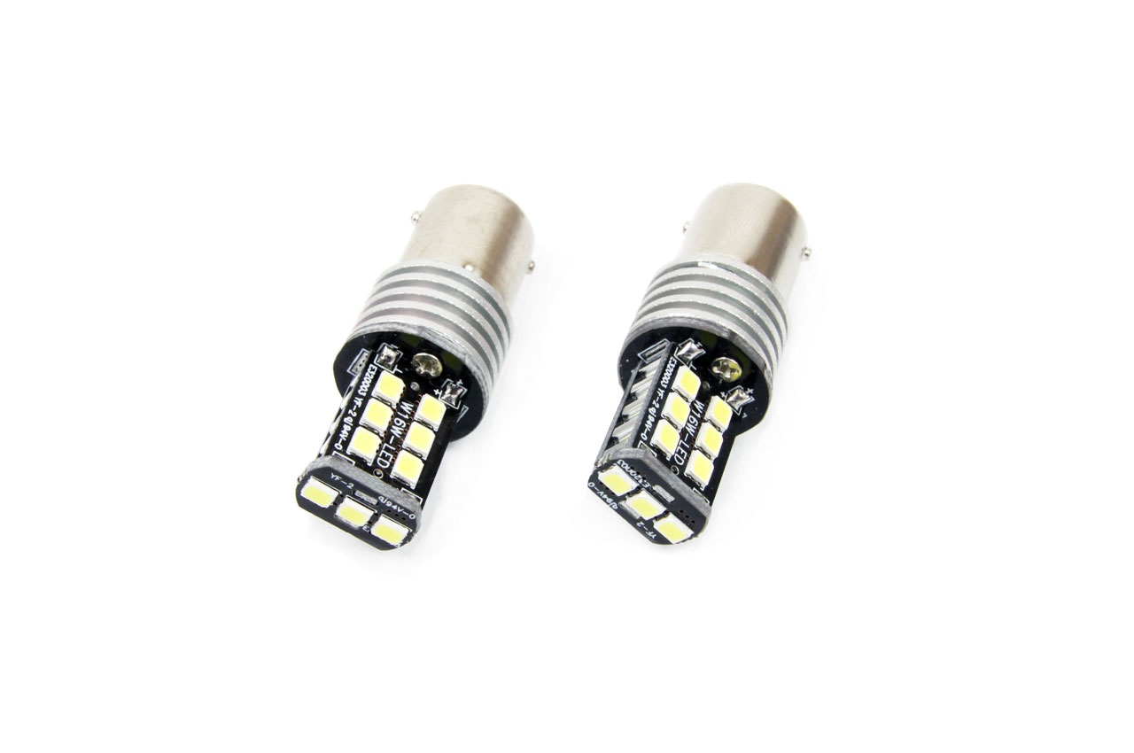 Set becuri auto cu LED CANBUS compatibil P21W BA15S 15 SMD 7.5W Alb 12/24V, destinat competitiilor auto sau off-road